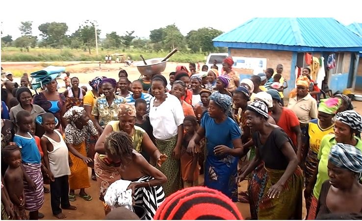 Figure 1: Displaced persons in a song and dance session